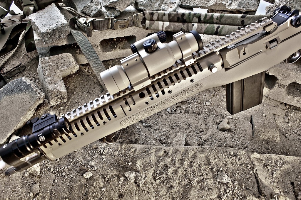 The Vltor CVAS-14 upper handguard features a full- length top and offers multiple mounting points for Picatinny rails. Aimpoint optic is coated in Polymax.
