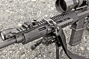 The rifle’s proprietary handguard is highly customizable through bolton Picatinny rail sections and grip panels. A Magpul RSA sling mount and MS3 sling are pictured.