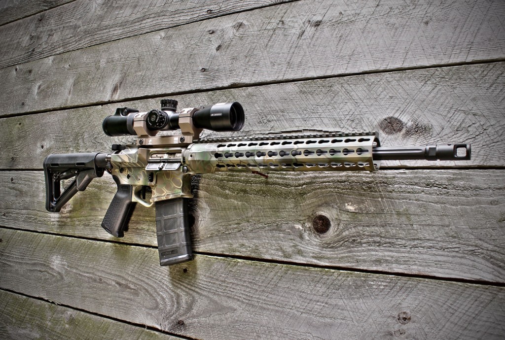 Here's our completed .300 BLK rifle—wearing a Nikon M-.300 BLK 1.5-6x42 (with a .300-BLK-specific BDC reticle) in an FDE-colored American Defense AD-Delta QD mount—ready to get down 'n dirty in the deer woods.