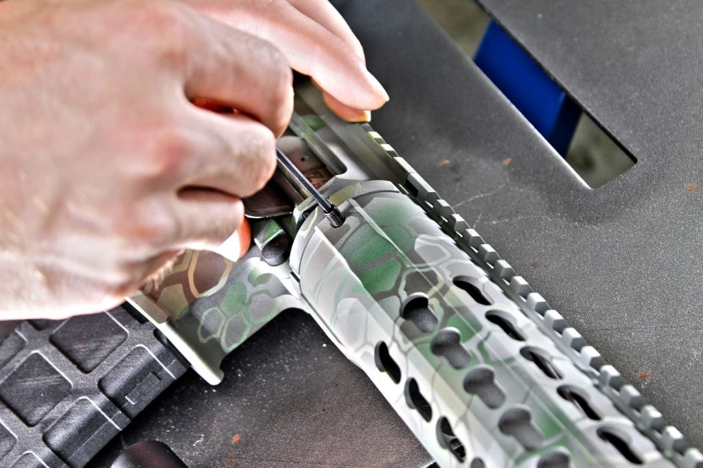 The next step is to liberate your rifle of its handguard. This procedure varies widely based on manufacturer, but with the particular Keymod rail fitted to this rifle, it simply required removal of three Allen-head set screws and unscrewing the forend from the threaded barrel nut.