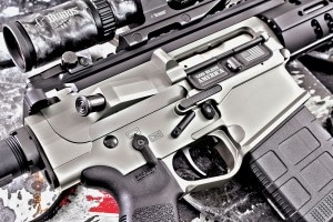 Ambidextrous controls adorn the right side. A bolthold button is tucked inside the integral, enlarged-triggerguard, and easily operated by the trigger finger.