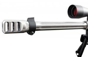 Threaded onto the muzzle of the 14-inch-fluted barrel is a massive and extre mely effective three-port muzzle brake. Similar to the gas block of an AR-15, The unique black-ramped front iron-sight clamps around the entire circumference of the barrel.