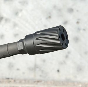 The Elite Iron CQC 1 muzzle device which replaced the factory A2 flashhider and doubles a sound suppressor attachmentis a two piece unit. You can Run it as a compensator, or with the cover attached (shown) to direct flash and muzzle blast forward.