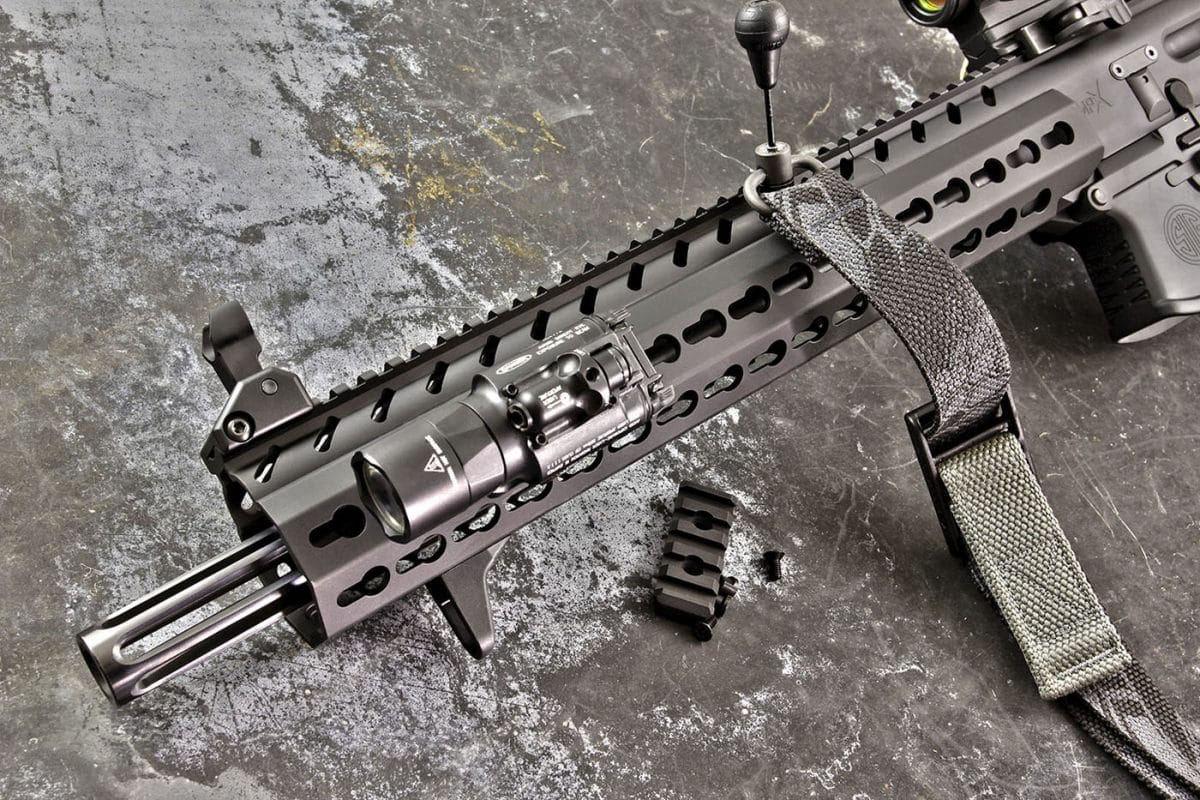 SIG fits the MPX Carbine with a full length rail system—the top section wit...