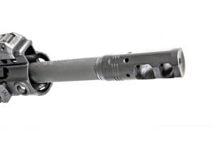 The DMR’s 18-inch, chrome-lined and hammer forged 2 barrel is given a 1:7 twist rate for stabilizing heavy grain weight bullets, and topped with a surefire procomp 556 muzzle brake.