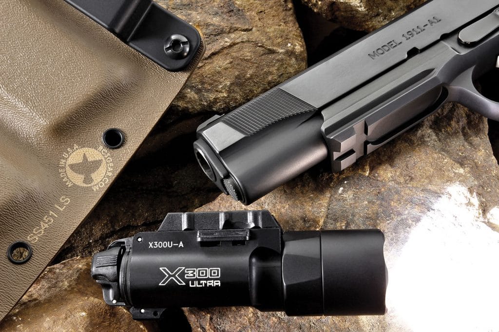 The Tactical model comes equipped with a icatinnyspec light rail milled into the dust cover, to which we mounted Sureires supercharged 00-lumen X300 ltra weaponlight (www.surefire.com—which proved to be a perfect fit in the Phantom Light Compatible Kydex holster. The pistol’s barrel bushing, recoil spring and guide rod are of the original John M. rowning configuration, which gets a big thumbs-up from the author—and On Target’s editor, too.