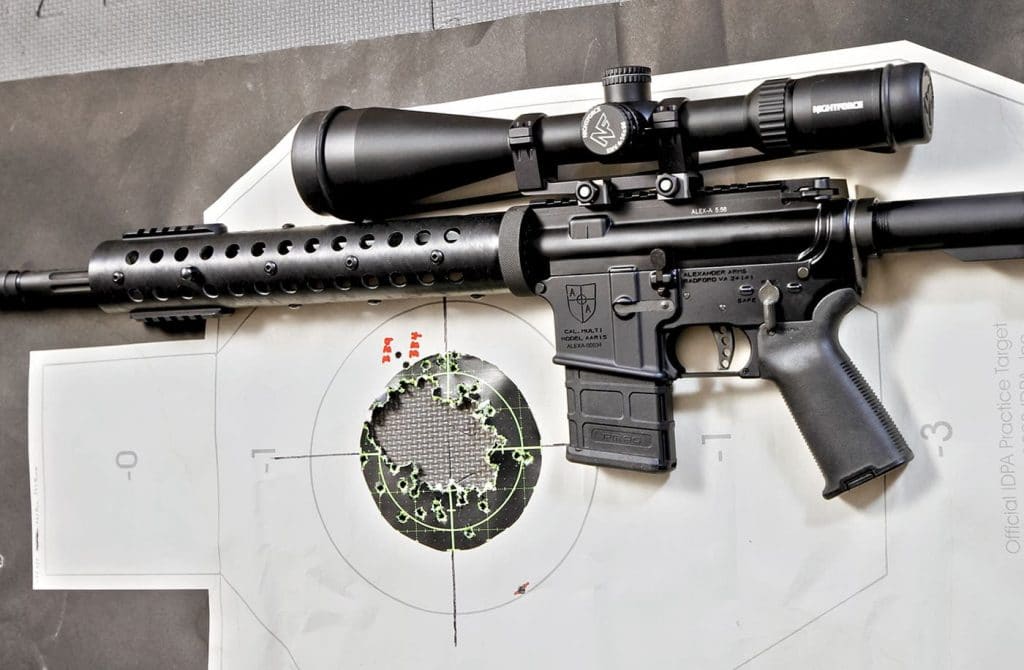 The Alexander Arms Rifle and Nightforce SHV scope used for testing (above). Our CFE223 hand loads went 334 rounds without cleaning before breaking the rim of the 2.5 MOA Tru-See target.