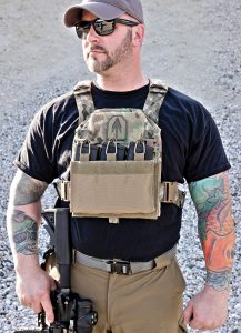 The AT Armor Contingency plat e carrier , fitted with a blue force gear 3-row mag pouch.